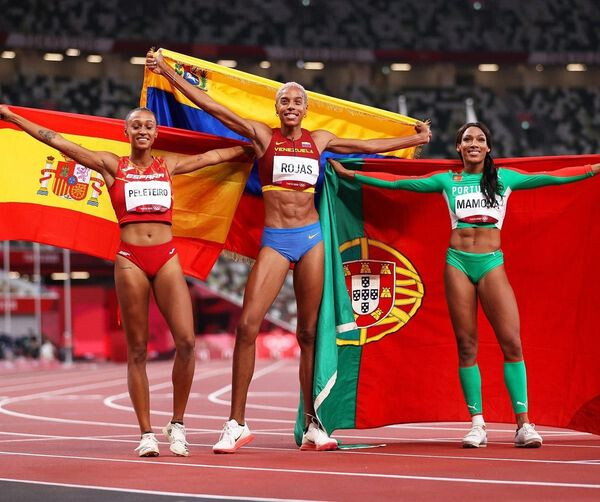 P&oacute;dio triplo salto