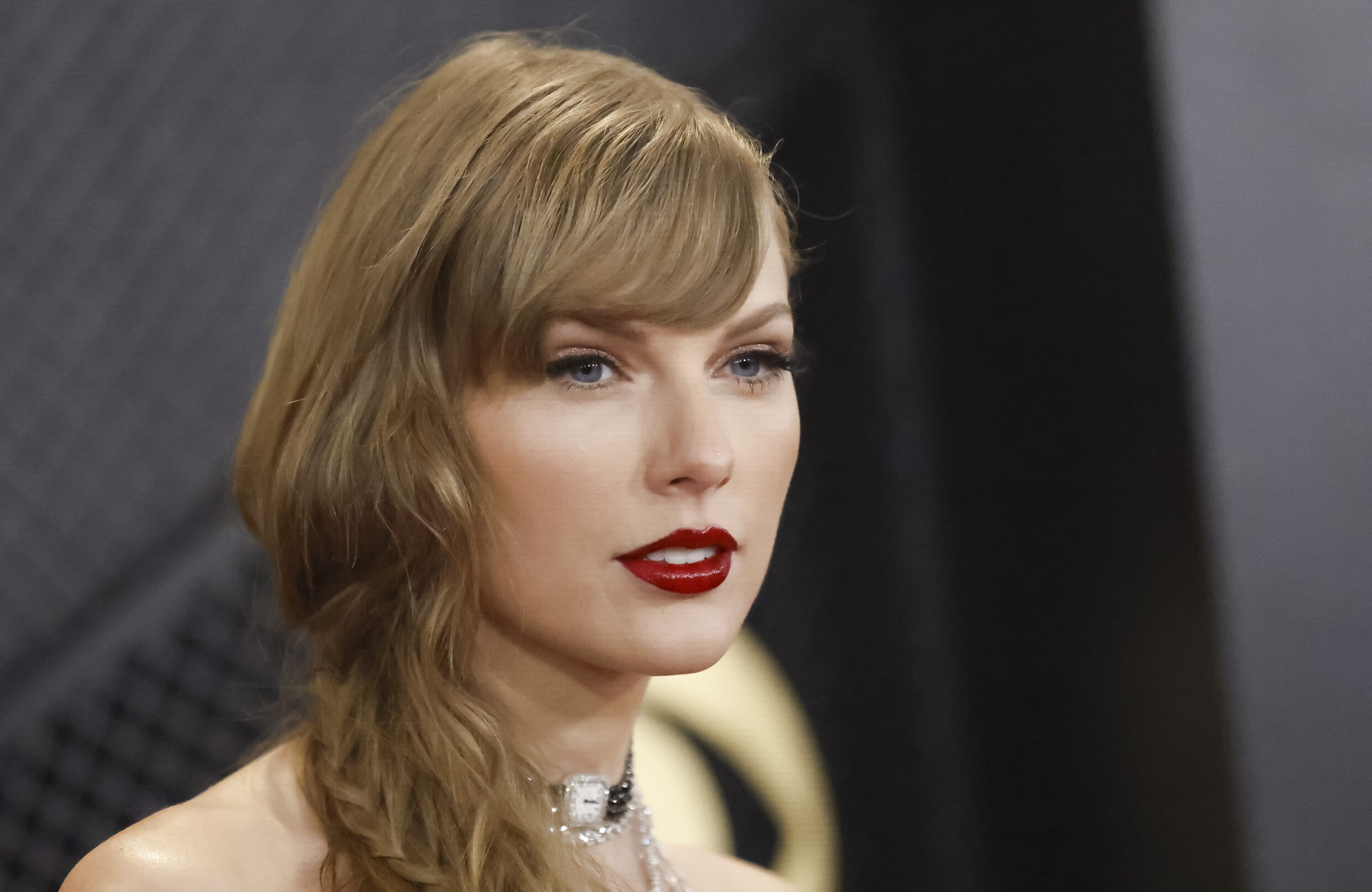 Taylor Swift has become the first artist to win the Grammy Award for Album of the Year four times