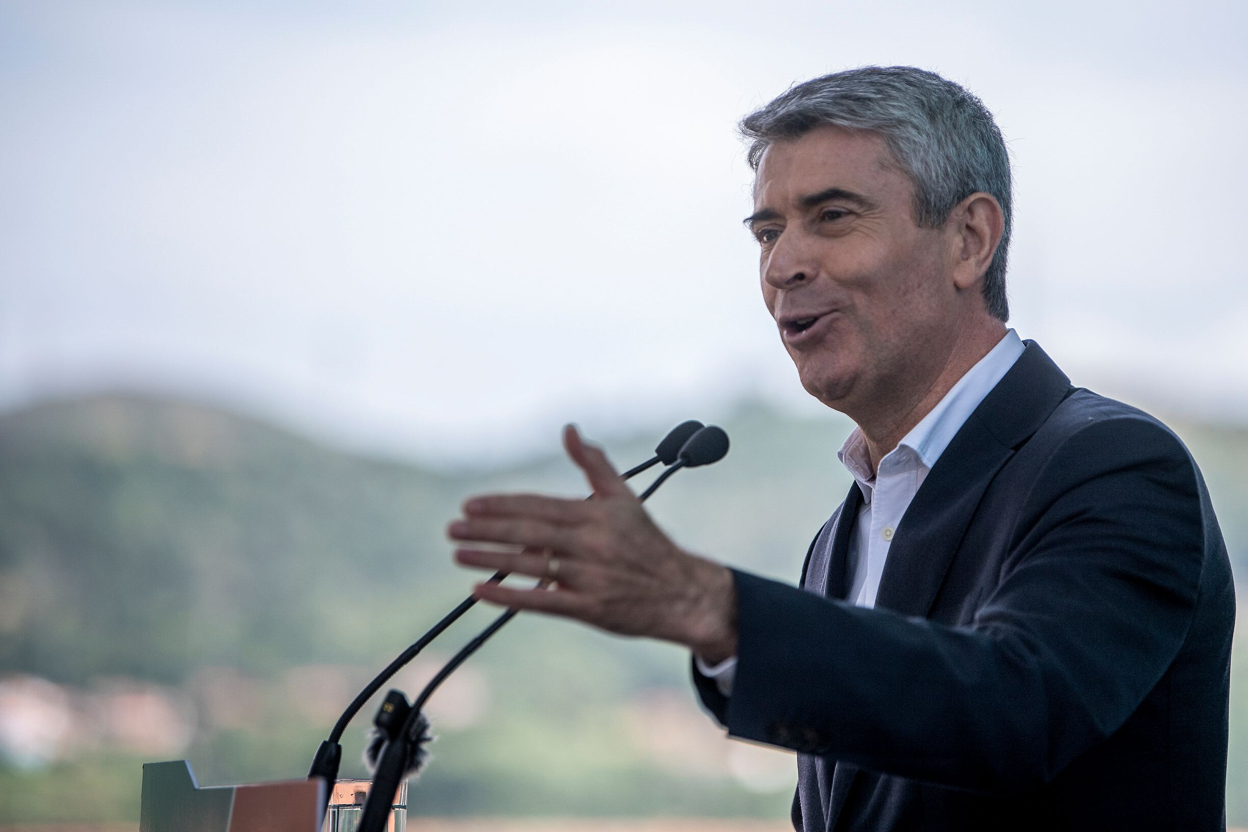 Socialist Leader Challenges Government to Fulfill Promises Amid Leadership Criticism