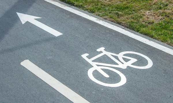 depositphotos_49732121-stock-photo-bike-lane-sign-on-asfalto